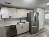 Building Photo - Beautifully Renovated 2 bedroom in Aurora! Right on the park and close to Stanley Marketplace!
