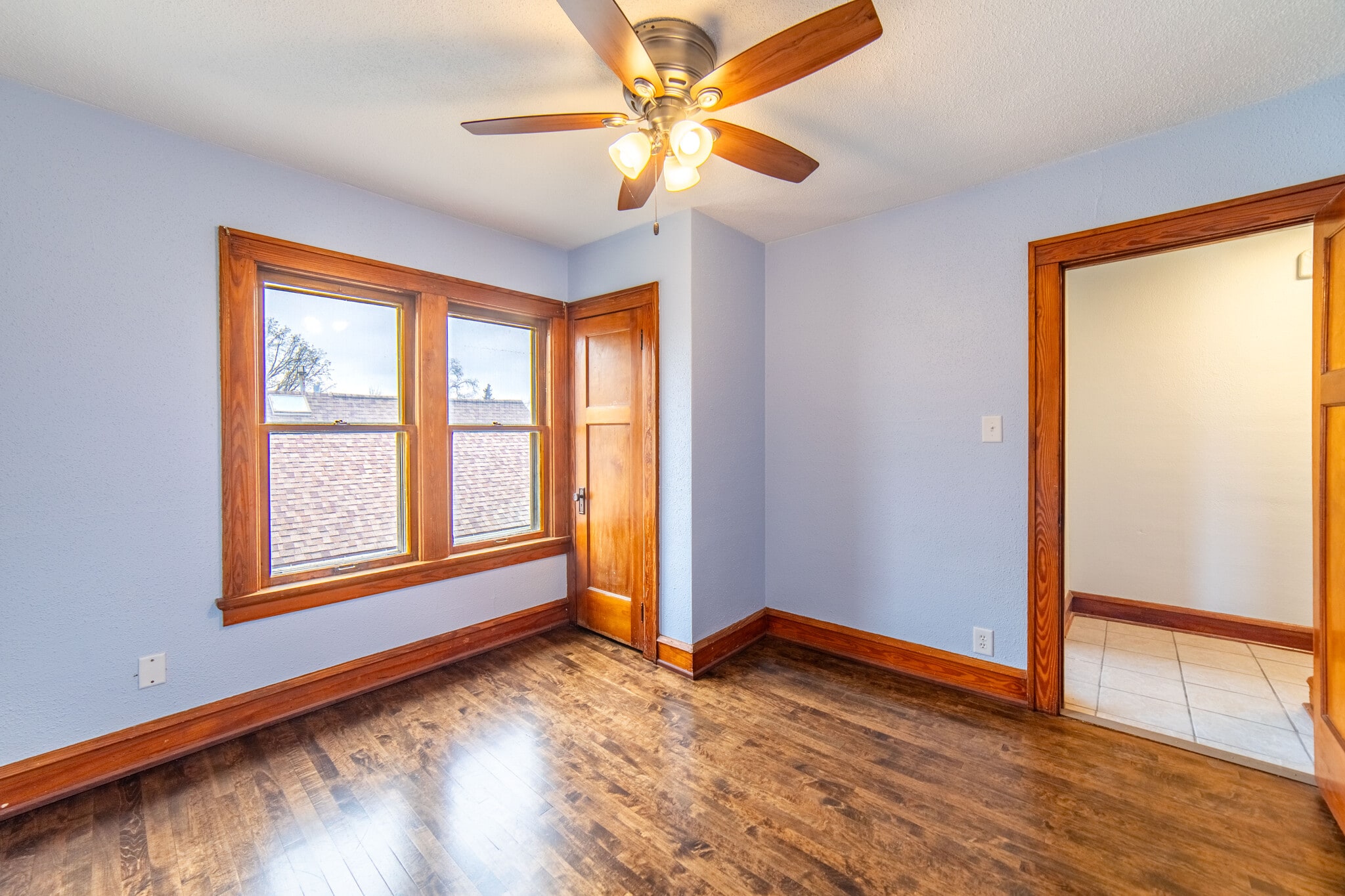 Primary bedroom at end of side hall past bathroom. - 5804 W Walker St