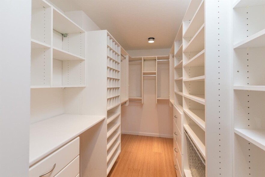 Master bedroom walk in closets - 1945 Mount Vernon Ct