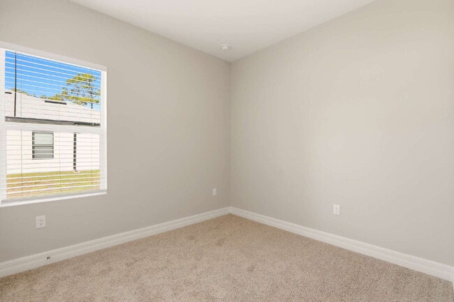 Building Photo - Brand New 4-Bedroom Gem with 2 Full Baths on Large Lot in Lehigh Acres – A Perfect Family Haven!