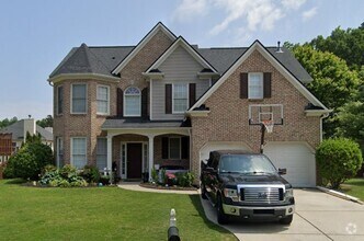 Building Photo - Spacious 4-Bedroom Home Near Mall of Georg...