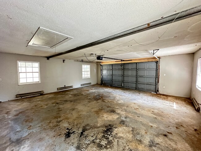 Building Photo - Charming 3BR/2BA Near Southwind | Hardwood Floors, Brick Fireplace, Bay Window & 2-Car Garage