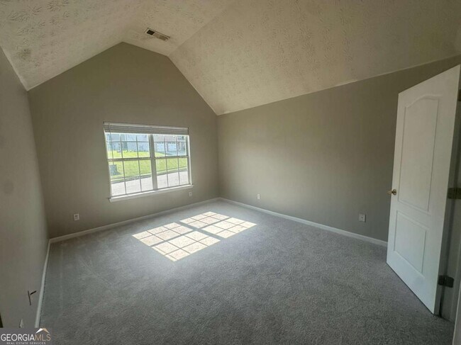 Building Photo - 7467 Petunia Dr