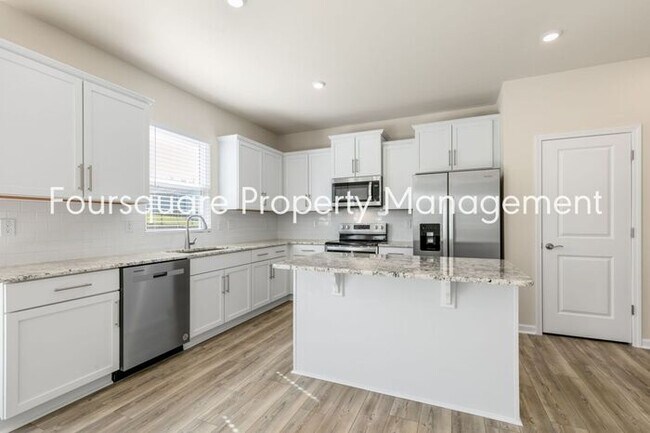 Building Photo - 4 Bedroom Home with 2nd Floor Loft- Kitchen Island & 2-Car Garage – Convenient Raleigh Location