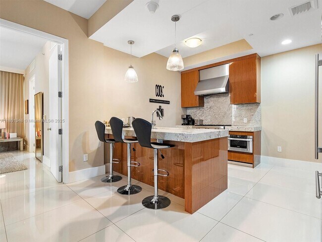 Building Photo - 9705 Collins Ave