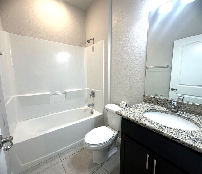 Building Photo - Available Mid April!! NW CAPE CORAL 3 BEDROOM 2 BATHROOM 2 CAR GARGAGE