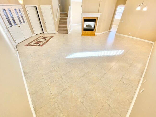Building Photo - THIS SPACIOUS RESIDENCE FEATURES 4 BEDROOM...