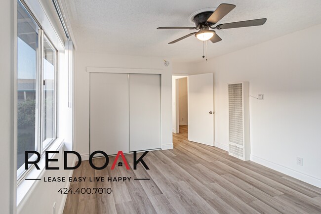 Building Photo - Bright and Welcoming One Bedroom with Air ...