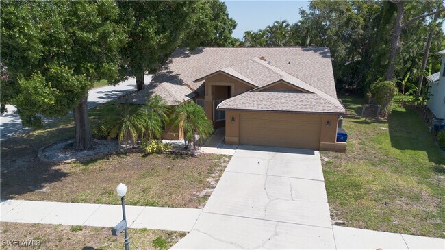 Building Photo - 9511 Cypress Dr N