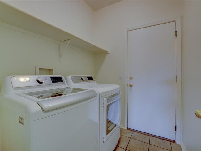 Building Photo - Ready Living: Solar Panels, EV Charging & Open-Concept Design!