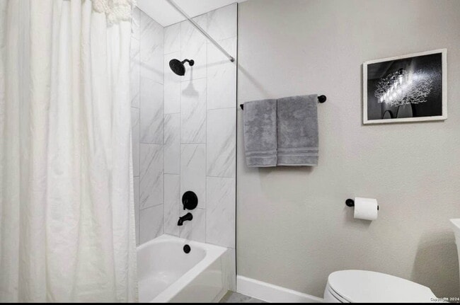 Building Photo - "Charming 4-Bedroom Home with Elegant Gran...