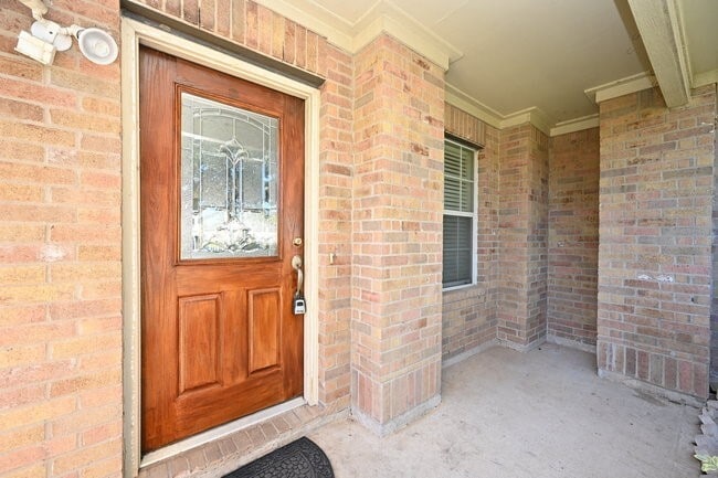 Building Photo - 9403 Coatsworth Dr