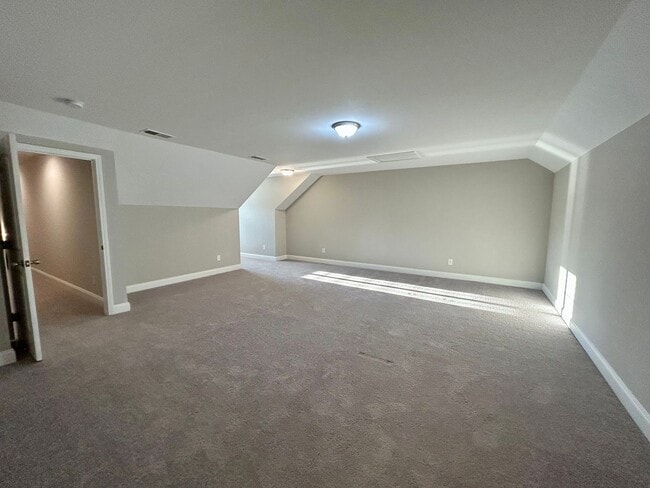 Building Photo - Spacious 3 bed, 3 bath home in Groves Park Commons featuring a modern kitchen, 2-car garage, and ...