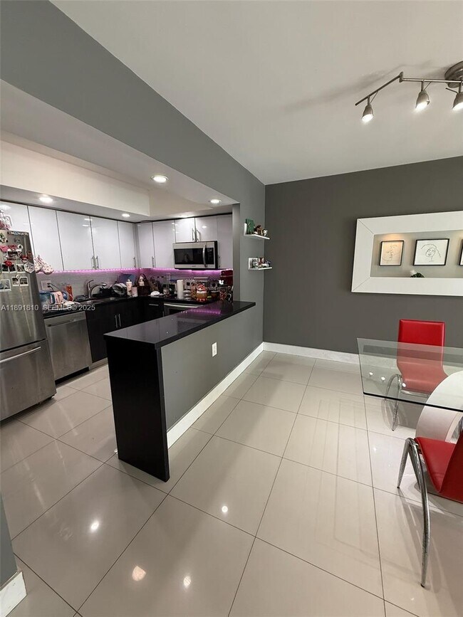 Building Photo - 19370 Collins Ave