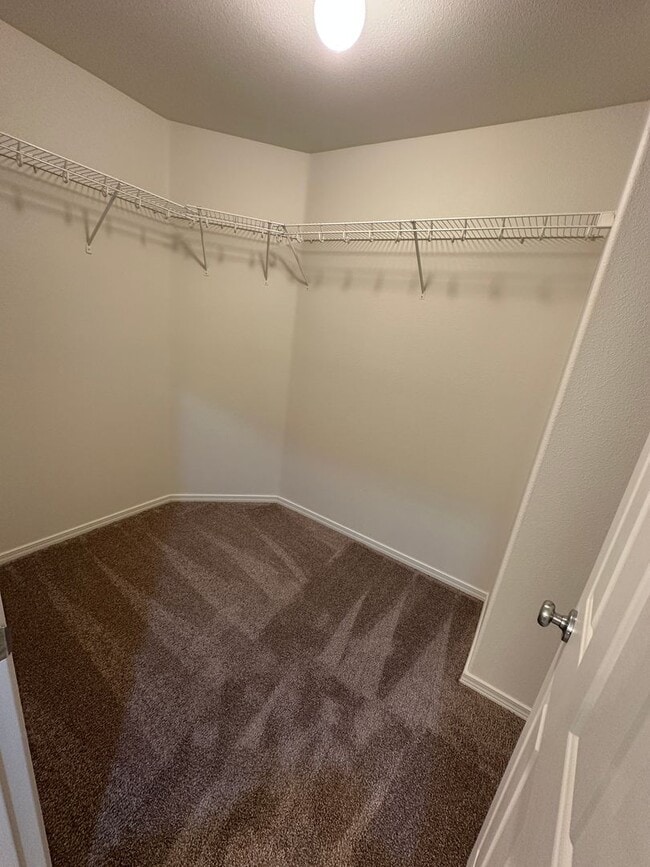 Building Photo - MOVE IN SPECIAL! Spacious 2 bed/2.5 bath with bonus room townhome off Road 68