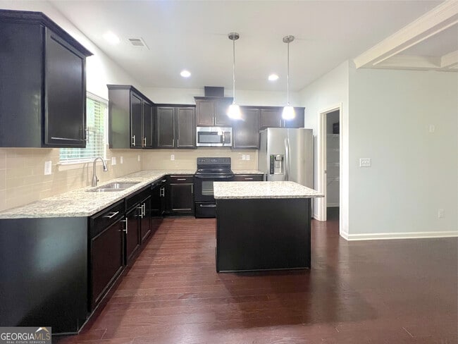 Building Photo - 6173 Roaring Rock Wy