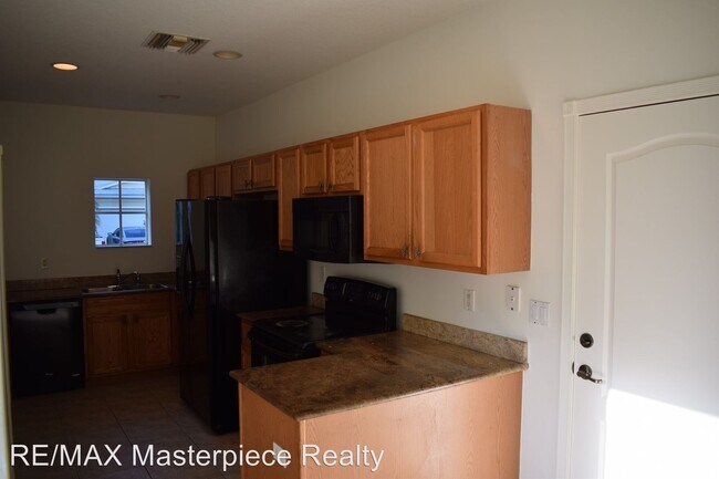 Building Photo - 4 br, 2.5 bath House - 2709 Creekside Dr