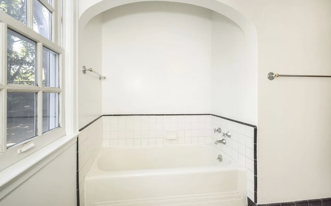 Building Photo - Charming Spanish Style Cottage with Incredible Deck- Gardener's Delight!