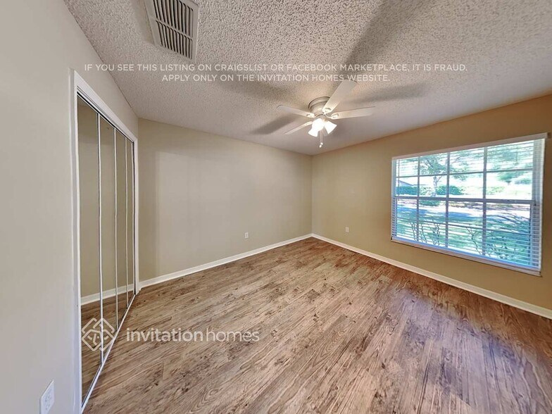 Building Photo - 1402 Whispering Woods Way