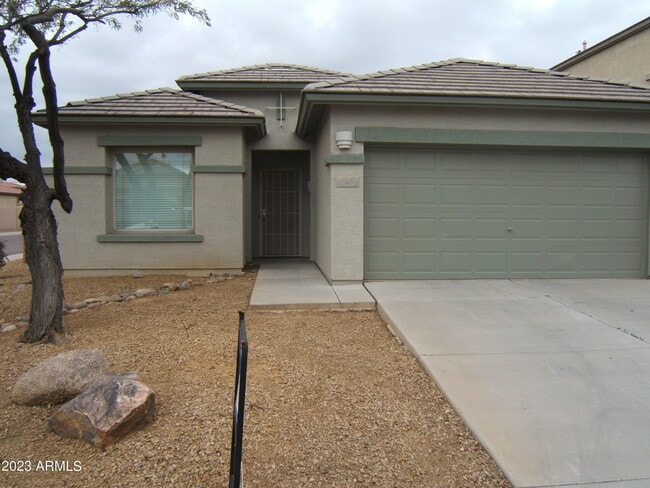 Building Photo - 9238 W Milkweed Loop