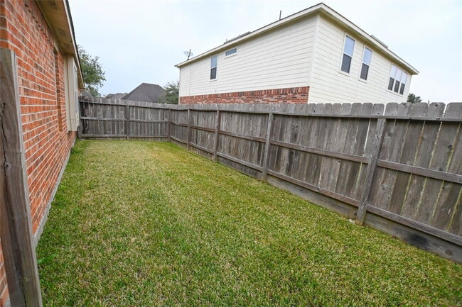 Building Photo - Promenade Lane, Pearland, TX 77584 - 4 BR 2 BA single-family home