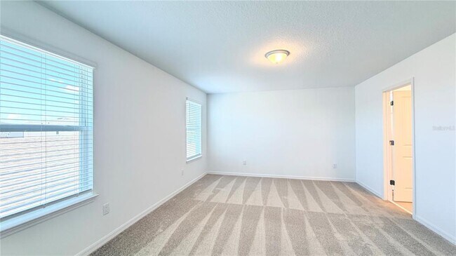 Building Photo - 5694 ENCHANTED MEADOW Aly