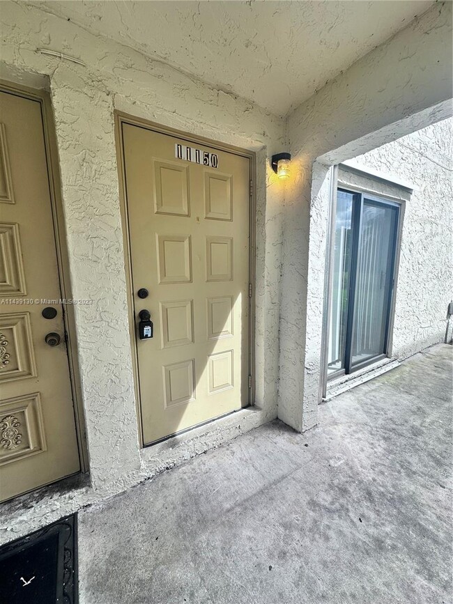 Building Photo - 11150 Royal Palm Blvd