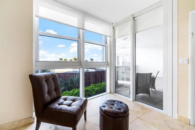 Building Photo - 18911 Collins Ave