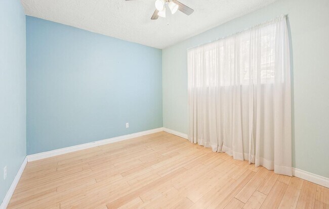 Building Photo - Spacious 2-Bedroom Condo with Forest Views, Private Balcony, In-Unit Laundry & Community Amenitie...
