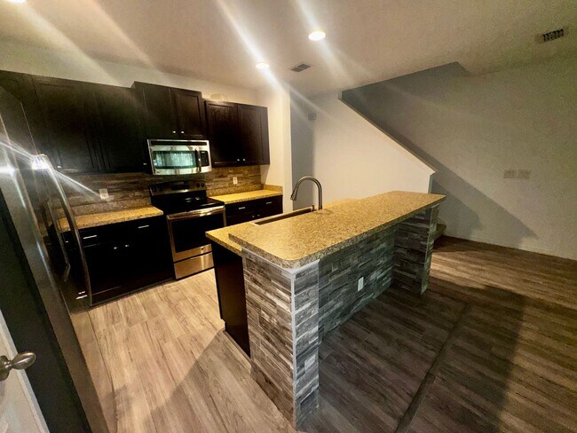 Building Photo - 3 Bedroom 3 Bath Kissimmee Emerald Lake Townhome with 2 Master Suites and Stainless Appliances!