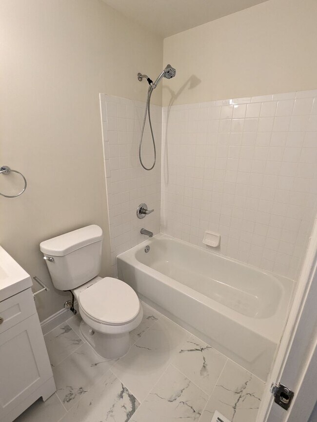 Building Photo - Renovated Townhouse in Frederick ready for...