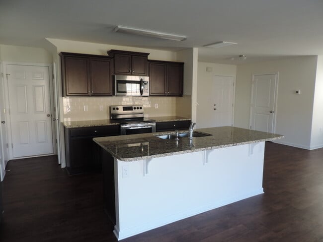 Building Photo - New, 4 bedroom home in the Hallstead commu...