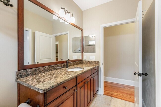 Building Photo - Captivating 3 bedroom house available for rent, wood floors, garage, screened porch renting for $...