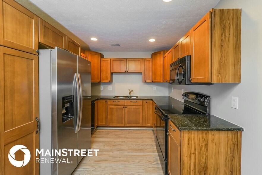 Building Photo - 7710 Dominique Dr