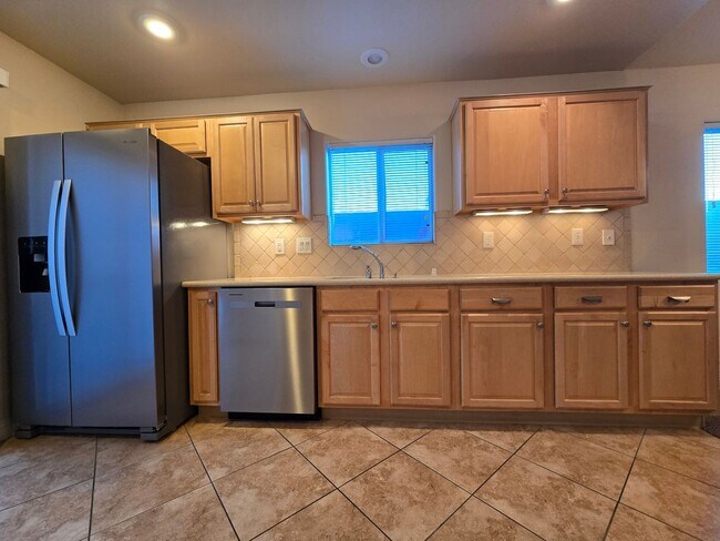 Building Photo - A Fabulous 3 Bedroom, 2.5 Bathroom, 2 Car Garage Townhome in NW Las Vegas