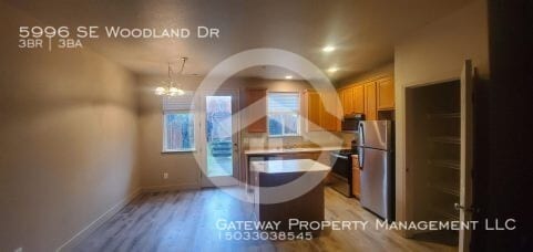 Building Photo - 5996 SE Woodland Dr