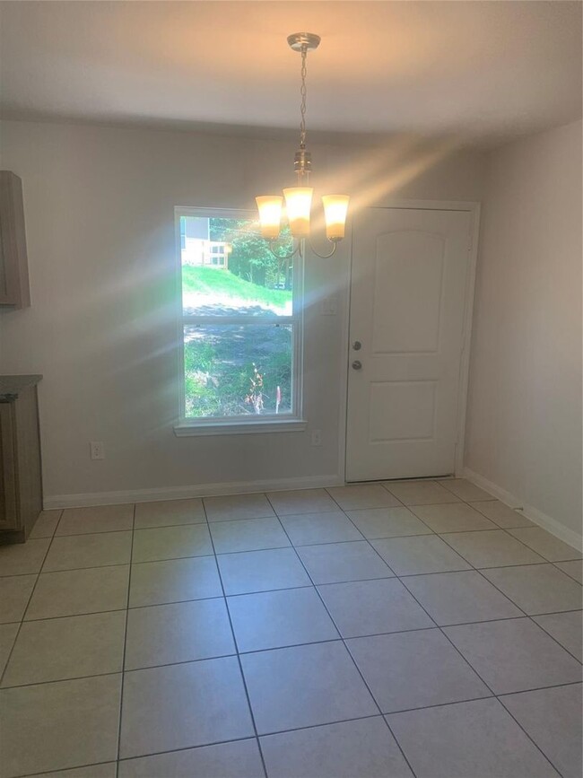 Building Photo - This home is a brand new beauty tucked bac...