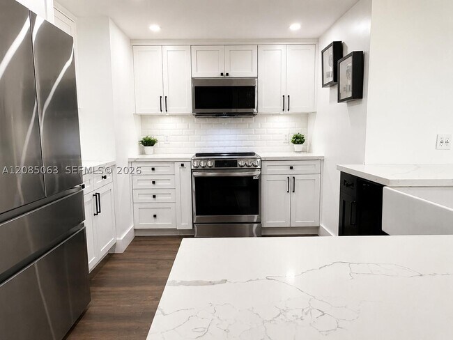 Building Photo - 8390 SW 72nd Ct