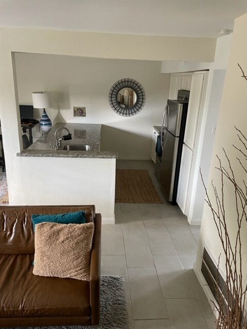 Open kitchen area has less huge counter. - 3131 Southwest Fwy