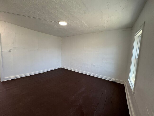 Building Photo - Newly Renovated Three-Bedroom, One Bathroom Row Home - Special Available – Contact Our Office for...