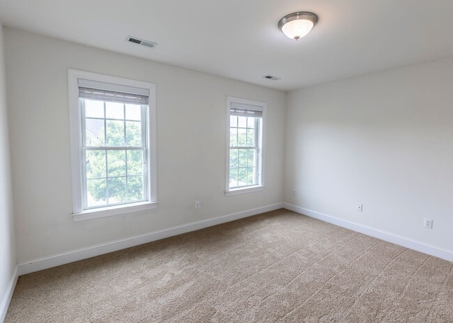 Building Photo - Huge house with vaulted ceilings and fenced in rear yard