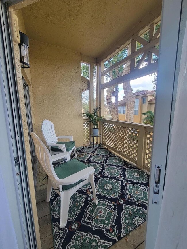 Building Photo - 4879 Via Palm Lakes