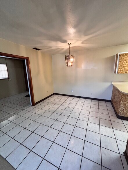 Building Photo - 3725 E 38th Ave