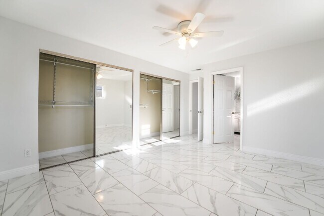 Building Photo - Single Story,  Totally Renovated , 3 bedroom, 2 bathroom Home with  extensive privacy and gated h...