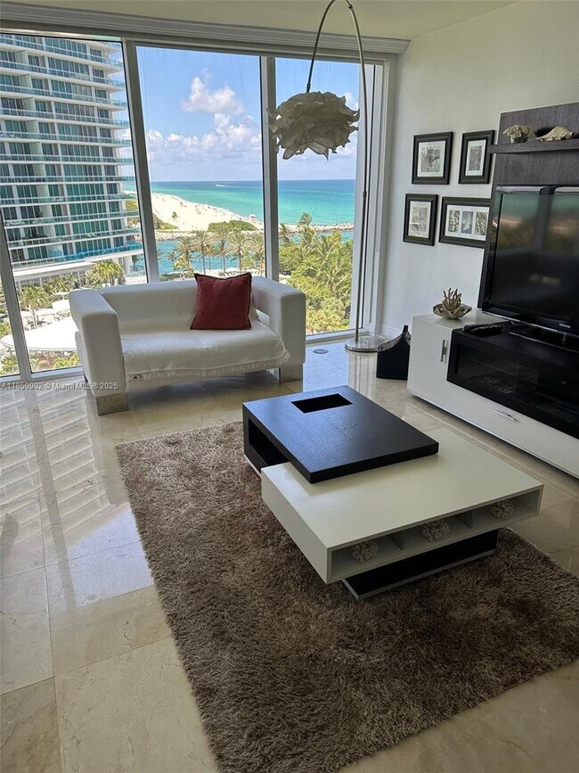 Building Photo - 10275 Collins Ave