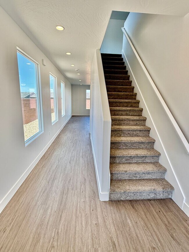 Building Photo - BRAND NEW Three Bedroom Townhome in Desert...