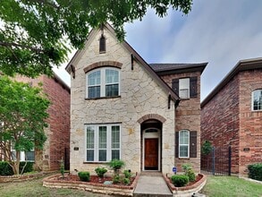 Building Photo - Sophisticated Style, Designer Updates & Gated Community Living