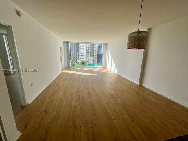 Building Photo - 10275 Collins Ave