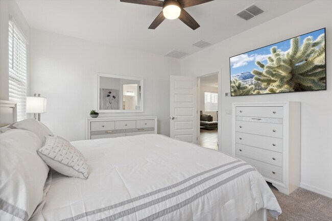 Second View of Primary Bedroom with Smart TV - 9014 W Oregon Ave