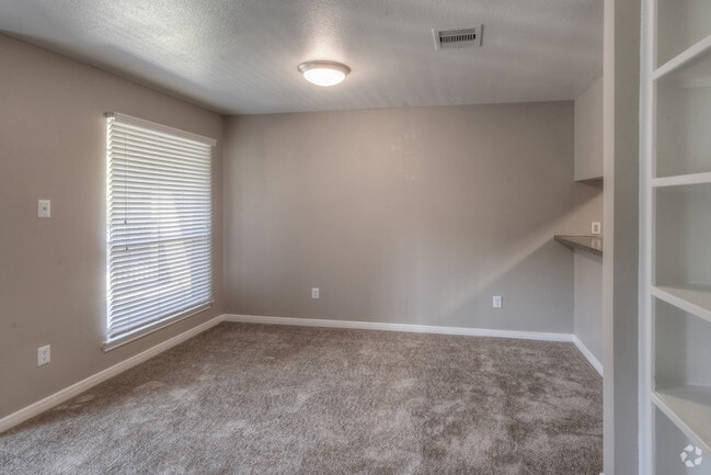 Living Room with Large Windows and Natural Light - Pebble Creek